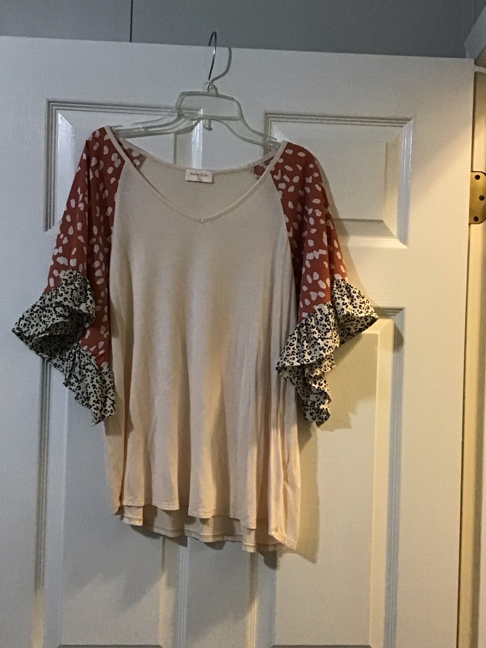 Cream Tunic with Rust-Patterned Ruffle Sleeves